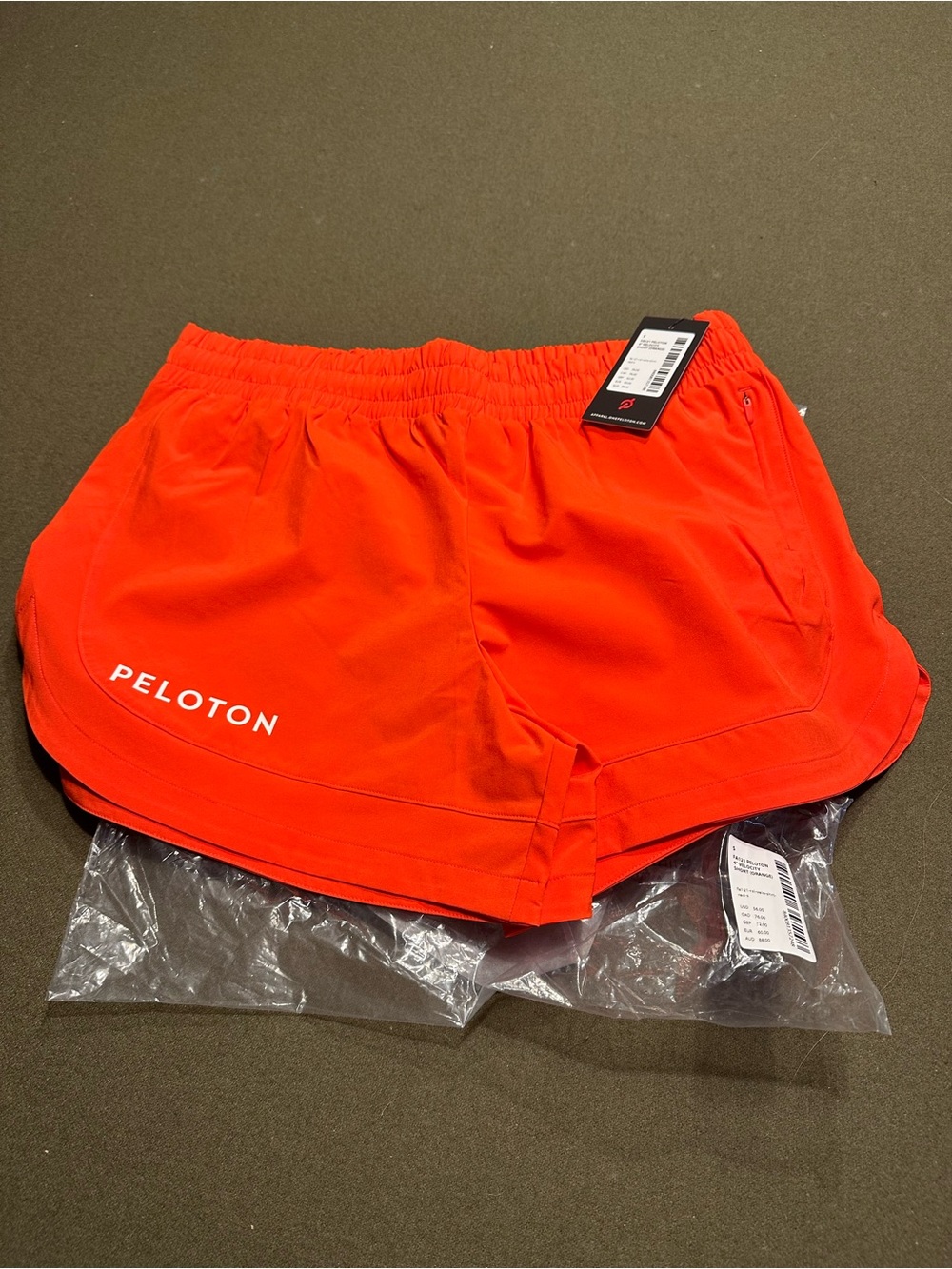 Peloton Women's Bright Orange Athletic Velocity Shorts Small NWT